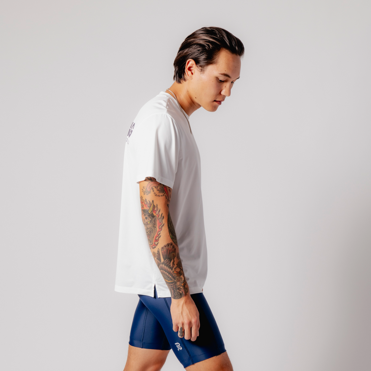 Drift™ Graphic Performance Tee "Bandit Running" - White