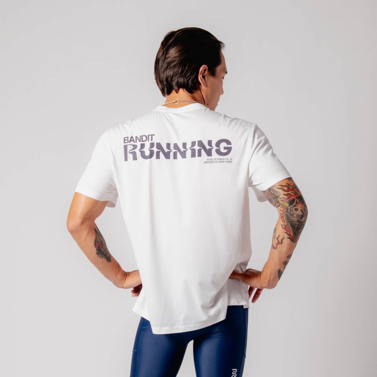 Drift™ Graphic Performance Tee "Bandit Running" - White
