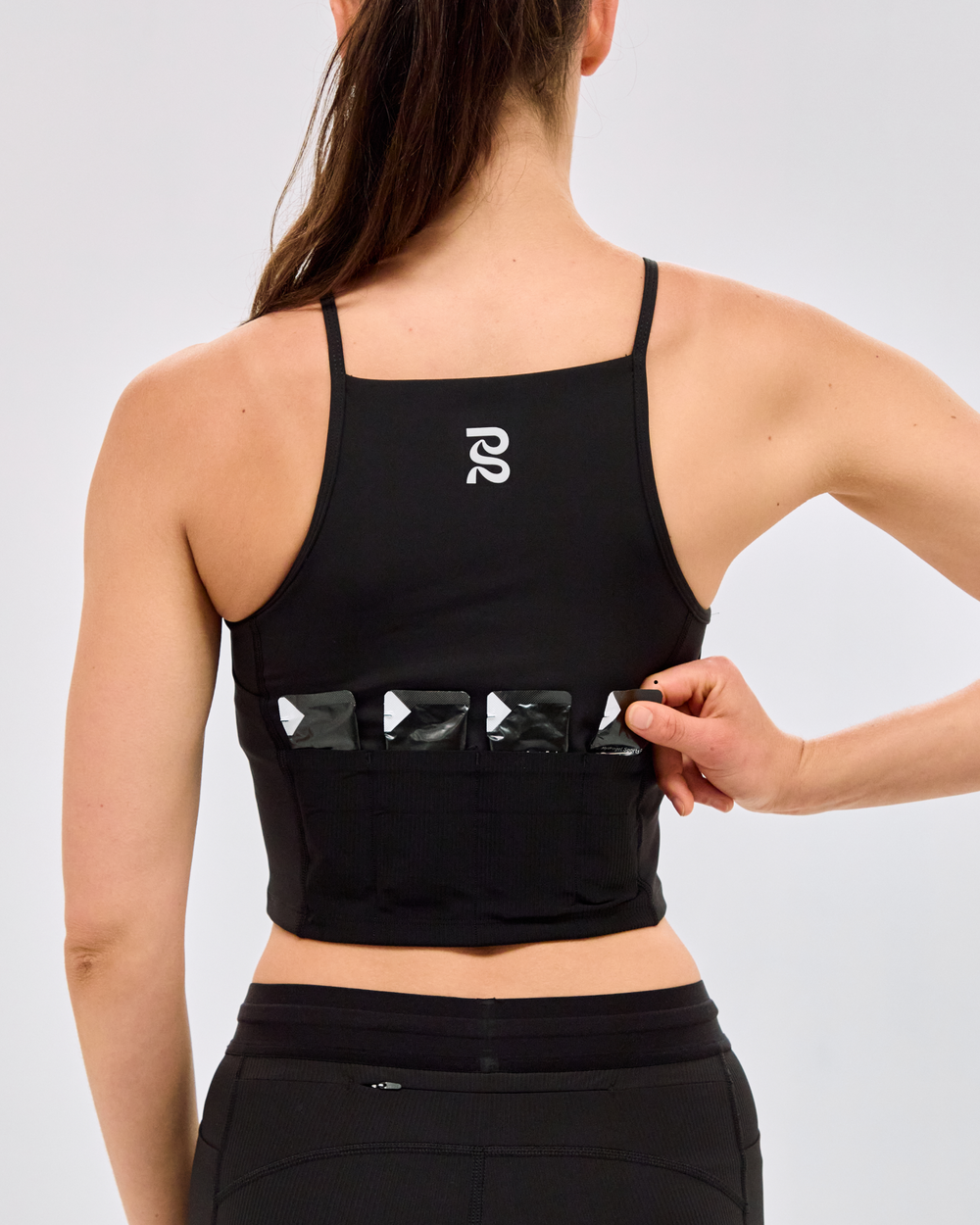 Stamina™ 6 Pocket Nova Crop | Bandit Running
