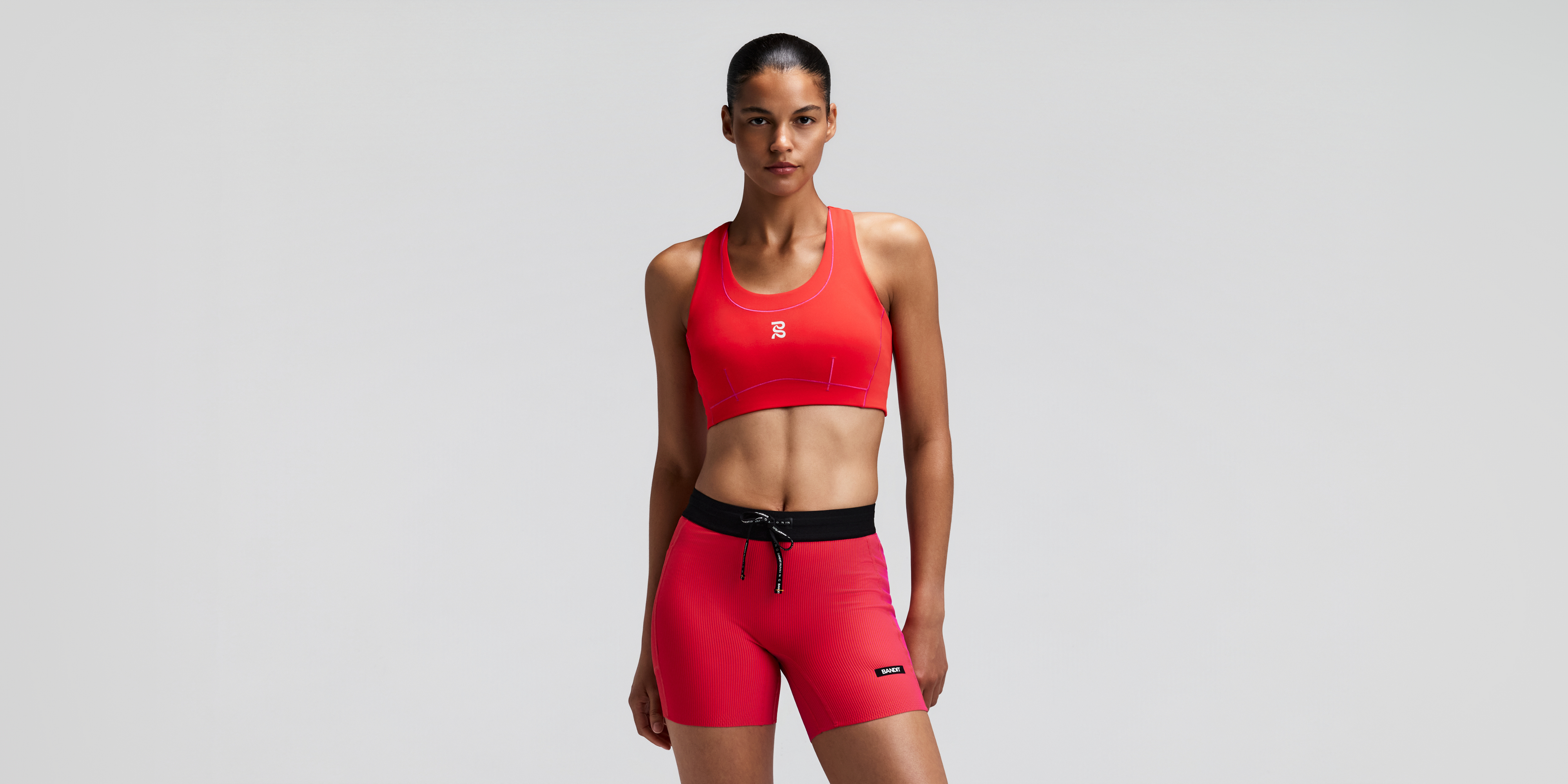 Women's Vanisher™ Pop Stitch™ Arco Run Bra - Poppy