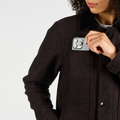 Thumbnail of The Off Track Herringbone Wool Jacket, Unisex - Deep Amber Brown