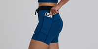 Thumbnail of Women's Striped Cadence™ 5" Compression Shorts - Ink Blue / Aegean
