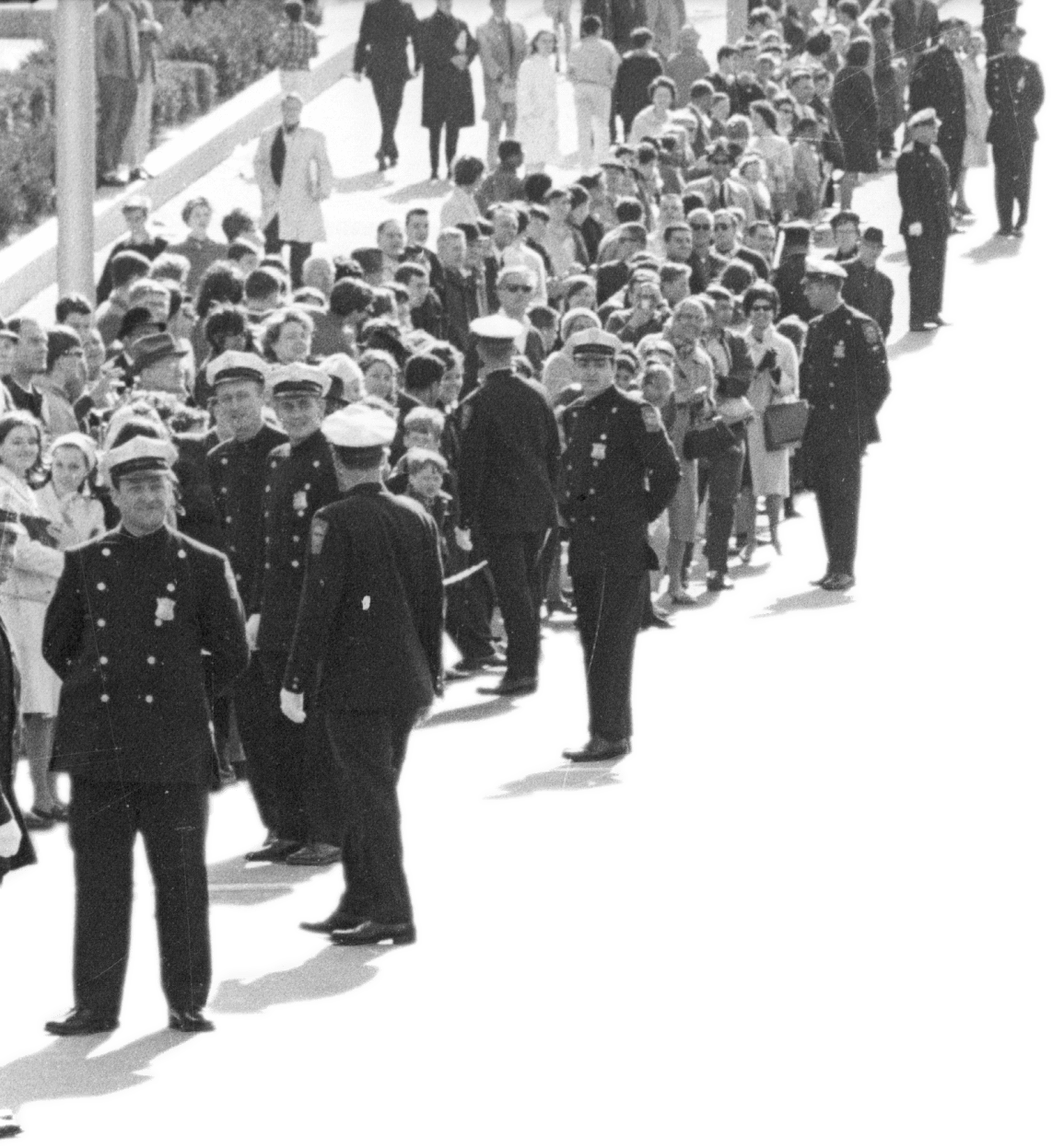 Crowd with police men